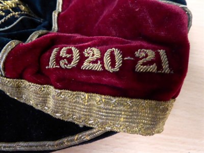 Lot 3002 - Rugby Cap maroon/black with lion and wheat sheaf badge, embroidered '1913-14' to brim and...