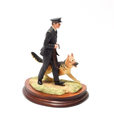 Lot 113 - Border Fine Arts 'Police Handler and German Shepherd Dog', model No. L122 by Anne Butler,...