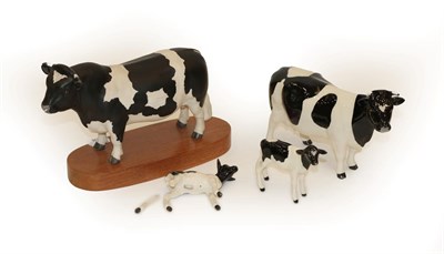 Lot 191 - Beswick Cattle Comprising: Friesian Bull, on wooden plinth, Friesian Cow Ch. ''Claybury...