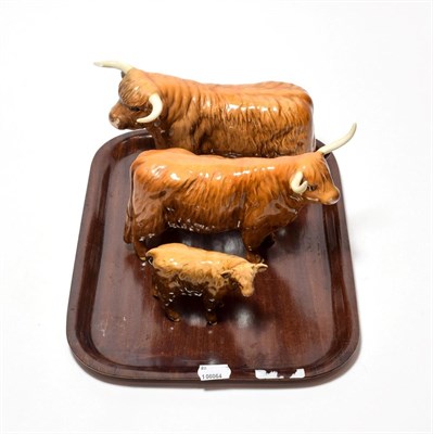 Lot 194 - Beswick Cattle Comprising: Highland Bull, model No. 2008, Highland Cow, model No. 1740 and Highland