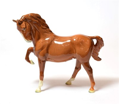Lot 211 - Beswick Horse (Head Tucked, Leg Up), first version, model No. 1549, chestnut gloss
