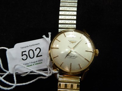 Lot 502 - An 18 carat gold automatic centre seconds wristwatch, signed Longines, model: Flagship, case...