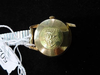 Lot 502 - An 18 carat gold automatic centre seconds wristwatch, signed Longines, model: Flagship, case...
