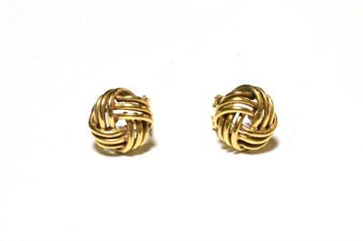 Lot 527 - A pair of 9 carat gold knot earrings, with post and clip fittings