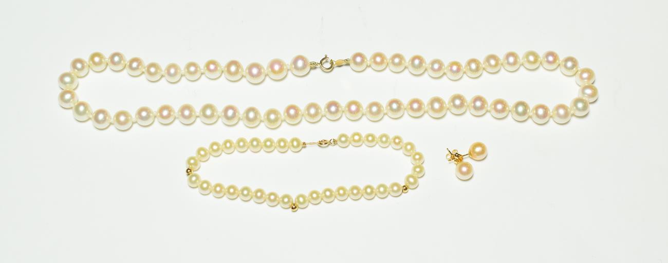 Lot 532 - A cultured pearl necklace, length 47cm; a cultured pearl bracelet, length 20.5cm; and a pair of...