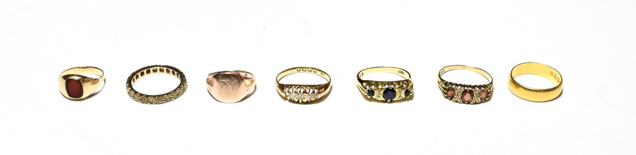 Lot 545 - A 22 carat gold band ring, finger size M; a 9 carat gold signet ring, finger size H1/2; a hardstone