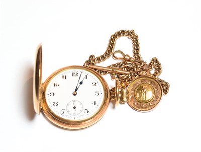 Lot 550 - A gold plated full hunter pocket watch, with an attached curb link watch chain with each link...