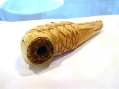 Lot 557 - A 19th century carved ivory Ducks head form cane handle, a Chinese Ivory page turner of similar...
