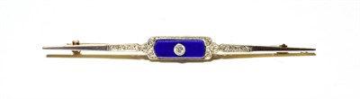 Lot 578 - A diamond and lapis lazuli bar brooch, stamped '15CT' and 'PLAT', length 7.3cm