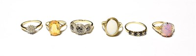 Lot 595 - A 9 carat gold diamond cluster ring, finger size N; a 9 carat gold citrine ring, finger size O;...
