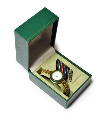 Lot 597 - A lady's interchangeable bezel Gucci wristwatch, signed Gucci, with Gucci box