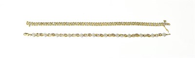 Lot 600 - Two 9 carat gold diamond bracelets, lengths 18cm and 18.5cm