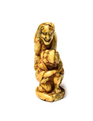 Lot 607 - A Japanese ivory netsuke, 19th century, two figures seated
