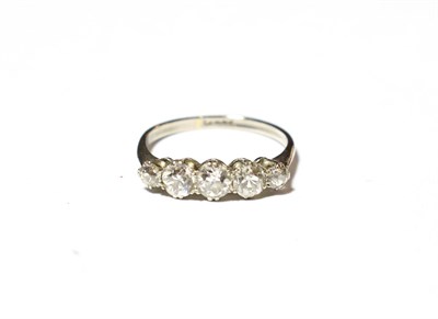 Lot 608 - A diamond five stone ring, stamped 'PLAT', finger size N