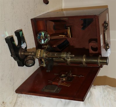 Lot 644 - A French brass microscope together with an associated case and a kaleidoscope