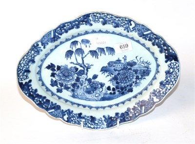 Lot 659 - A 19th century Chinese export blue and white porcelain dish of shaped lozenge form