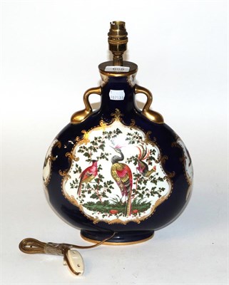 Lot 665 - A Sampson of Paris twin handled lamp painted with exotic birds