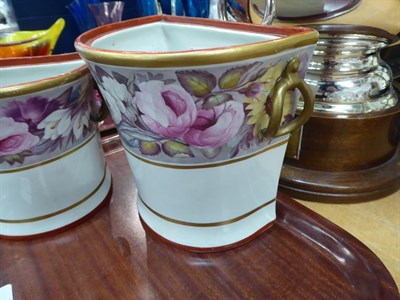 Lot 683 - A set of three 19th century Davenport floral painted porcelain bough pots (covers lacking)
