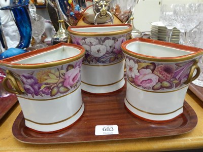 Lot 683 - A set of three 19th century Davenport floral painted porcelain bough pots (covers lacking)