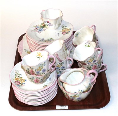 Lot 690 - Shelly Wild Roses, pattern No.13668 twelve place setting tea service