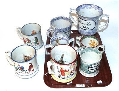 Lot 702 - A group of 19th century twin handled frog mugs, twin handled pedestal cup and a mug