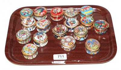 Lot 711 - A collection of seventeen Halcyon Days enamel Christmas trinket boxes, from 1990 to 2006 (no boxes)