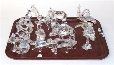 Lot 762 - Swarovski; a menagerie of animals and birds - including Flamingo, Bald Eagle, Heron, Camel,...