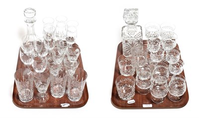 Lot 771 - Two trays of good cut glass drinking glasses including champagnes, tumblers, highballs, wines...