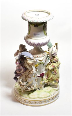 Lot 781 - A 19th century Continental hard paste porcelain figural centre piece in the form of the four...
