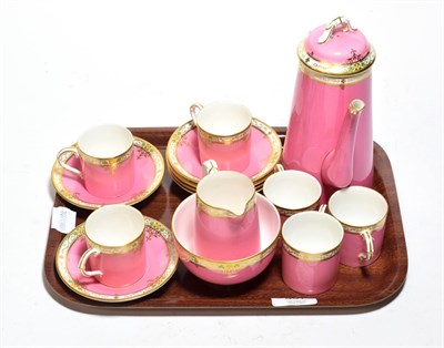 Lot 807 - A Royal Worcester pink and gilt highlighted coffee service