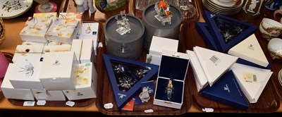 Lot 808 - Swarovski; a collection of approximately forty Christmas decorations (on three trays)