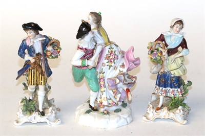 Lot 824 - A pair of 19th century Pairs porcelain figures, together with a similar figure group of dancers (3)