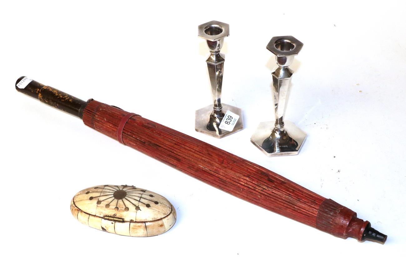 Lot 839 - A pair of silver candlesticks, a Japanese painted parasol, a brass mounted bone small jewellery...