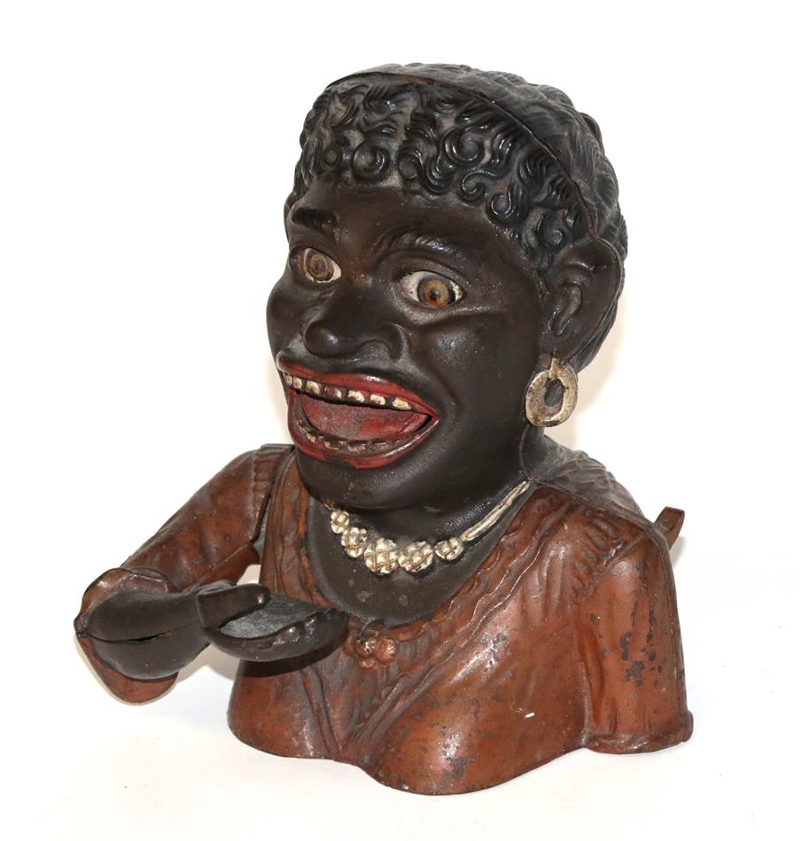 アンティーク雑貨 Cast Iron Dinah Mechanical Bank Lot 583 - AN EARLY 20TH-CENTURY CAST IRON 'DINAH'