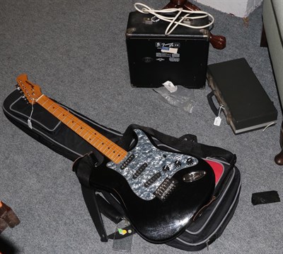 Lot 926 - A Fender amp; a Manhattan electric guitar; and an oboe in soft case