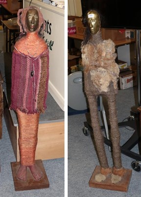 Lot 950 - Two 20th century Native American statues, composed of rope twist wool and fur on rootwood, with...