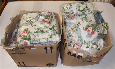 Lot 951 - Three pairs of glazed chintz floral curtains with pink rose heads, blue silk ribbons, lined and...