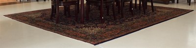 Lot 1104 - Tabriz carpet of unusual size, the indigo field of vines centred by a flowerhead medallion...