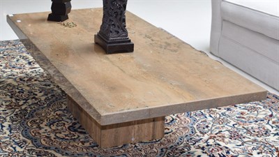 Lot 1119 - A travertine coffee table, retailed by Barker & Stonehouse, 150cm wide