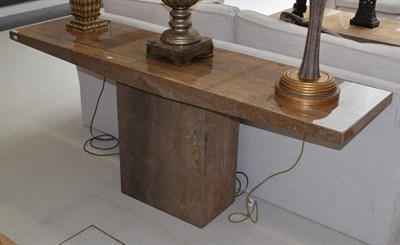 Lot 1120 - A travertine console table, retailed by Barker & Stonehouse, 181cm wide
