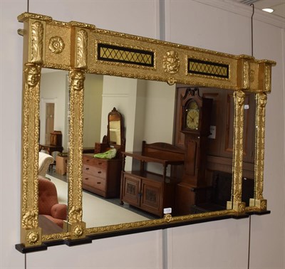 Lot 1129 - A gilt framed sectional over mantel mirror