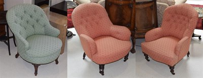 Lot 1135 - A pair of Victorian mahogany framed button back tub chairs upholstered in contrasting pink and...