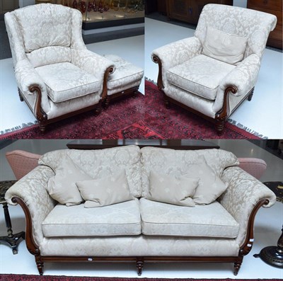 Lot 1143 - A good quality mahogany framed four-piece lounge suite upholstered in cream floral fabric