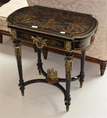 Lot 1146 - A 19th century French ebonised and inlaid parcel gilt metal mounted occasional table, fitted with a