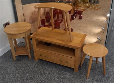 Lot 1147 - Three modern light wood occasional tables; a similar low stand; and coffee table (5)