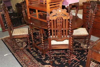 Lot 1174 - A set of four Victorian carved oak armchairs
