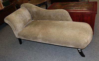 Lot 1186 - A chaise longue, with fabric covering in a shabby style