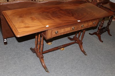 Lot 1187 - A reproduction mahogany and ebony strung sofa table