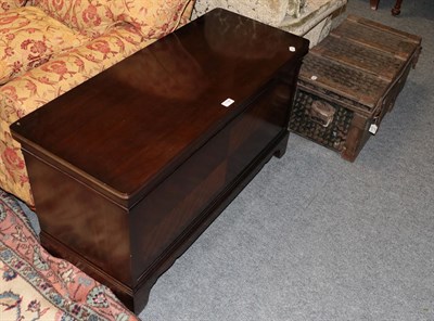 Lot 1196 - A modern mahogany blanket box and a floral upholstered blanket box (2)