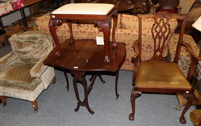 Lot 1198 - A carved mahogany dressing stool with drop-in seat; a carved mahogany armchair; an Edwardian...